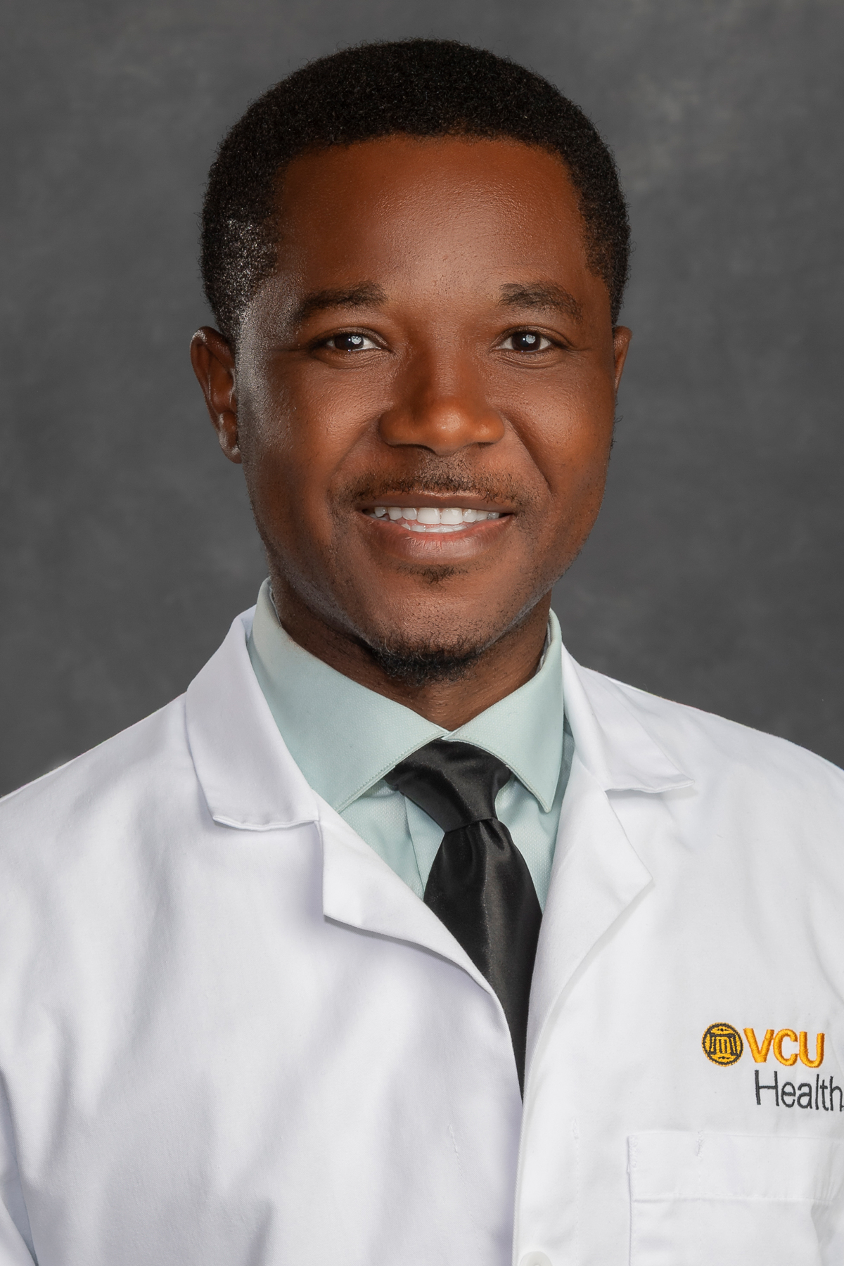 Reginald "Reggie" Osardu, M.D.